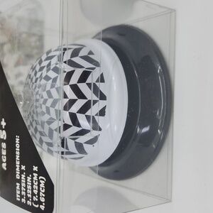 Bell with Black and White Geometric Design